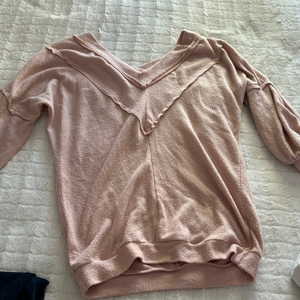 Peach, oversize sweatshirt good to throw on before the gym or yoga